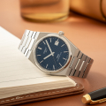 Đồng hồ Nam TISSOT T-Classic PRX Titanium T137.807.44.041.00